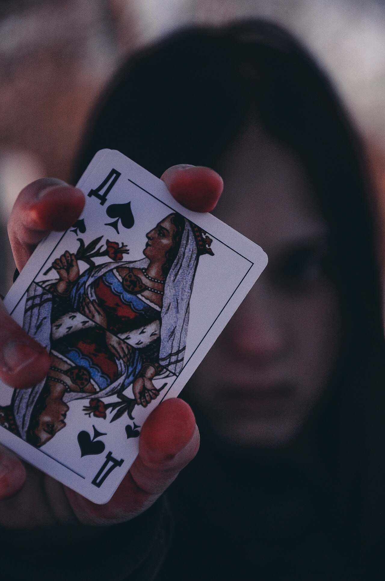 Drama Queen Photo by Andrei Kotovikov: https://www.pexels.com/photo/a-person-holding-a-card-11201021/