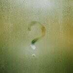 real life moments in Tarot. Image of a question mark on foggy window.