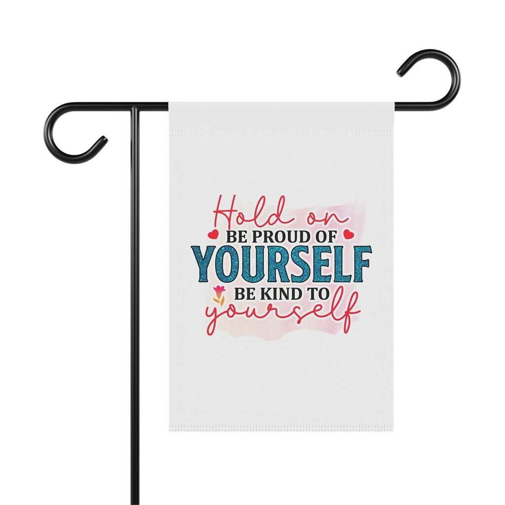 Bring a breath of encouragement to your outdoor space with this heartfelt Garden Banner. Set on a crisp white background, the message reads: &ldquo;Hold on. Be proud of yourself. Be kind to yourself.&rdquo;