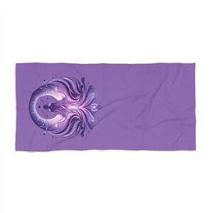 Image of a purple towel with the Talk With Colleen logo imprinted upon it.