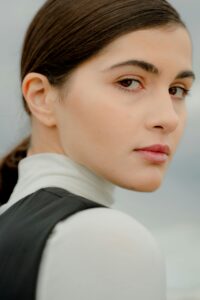 Image of a woman looking confidently into the camera.