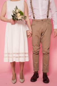 Image of a wedding couple dressed casually
