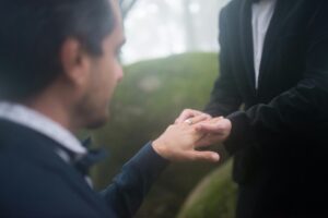 Couple exchanging rings and vows