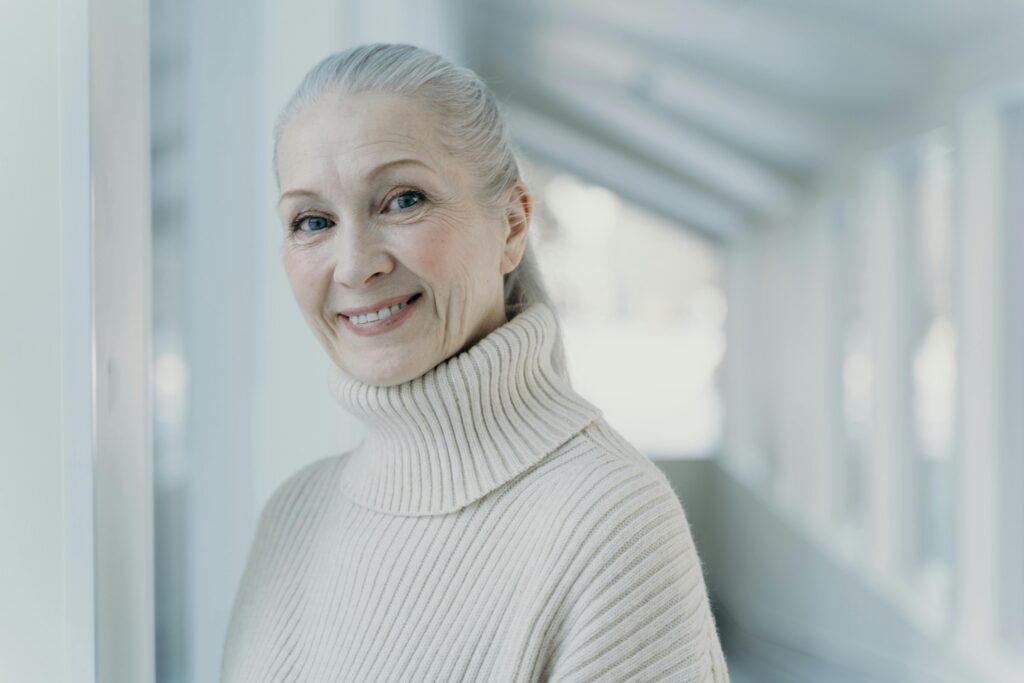 Image of a woman smiling into the camera