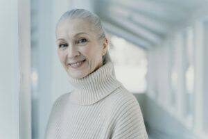 Image of a woman smiling into the camera
