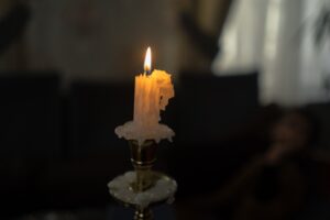Image of a candle burning with an interesting pattern.