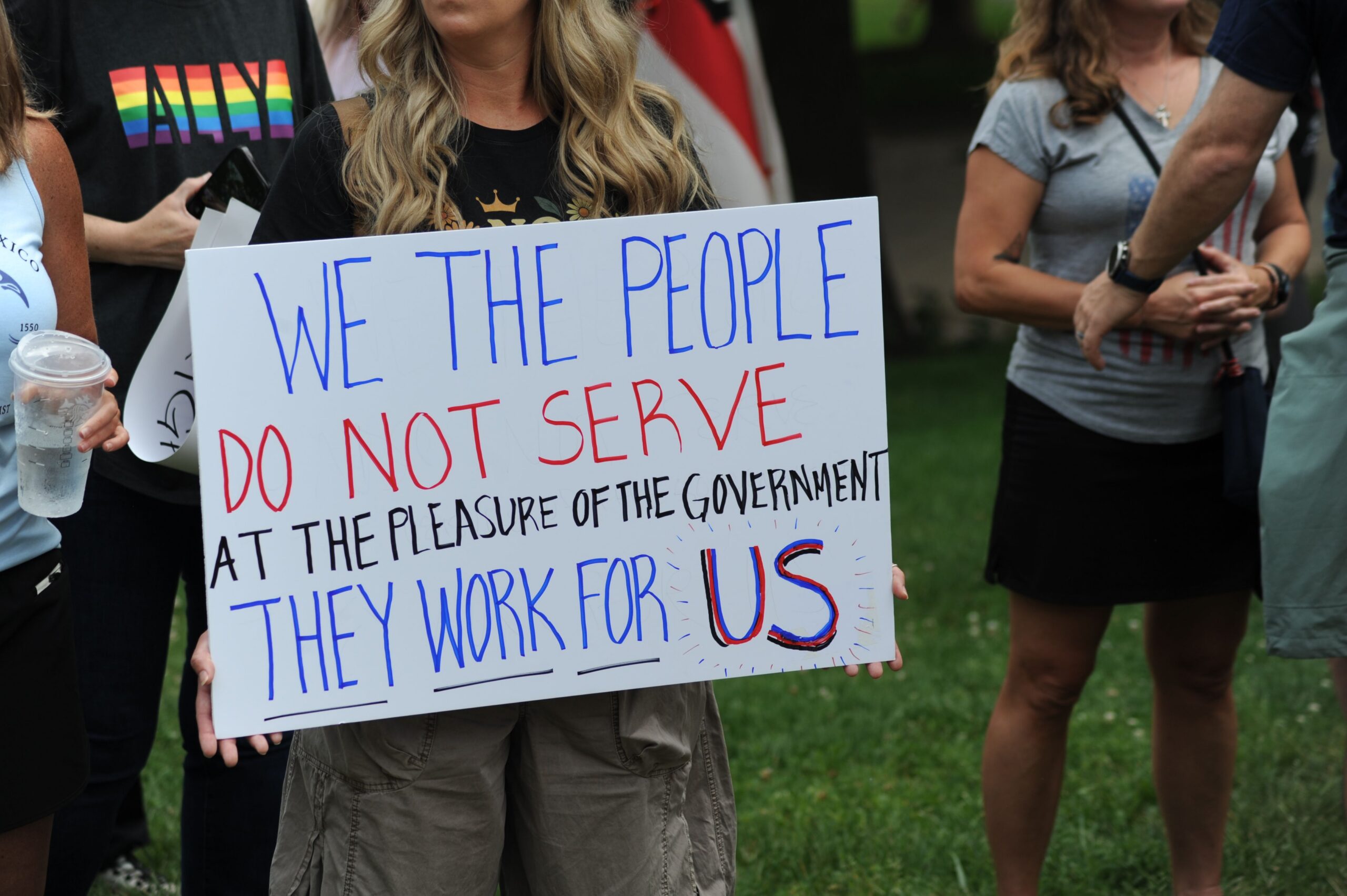 Image of protesters with signs.