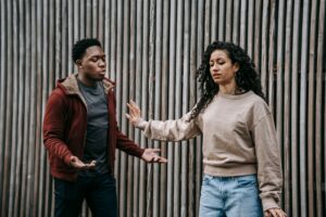 Image of two people having a clear argument