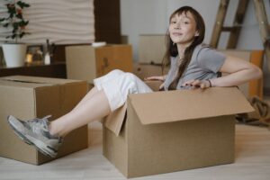 Image of a woman stuck in a box.