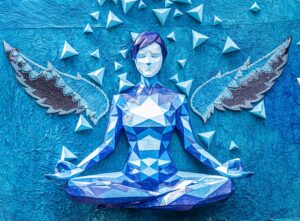 Image of an angel relief on a blue wall.